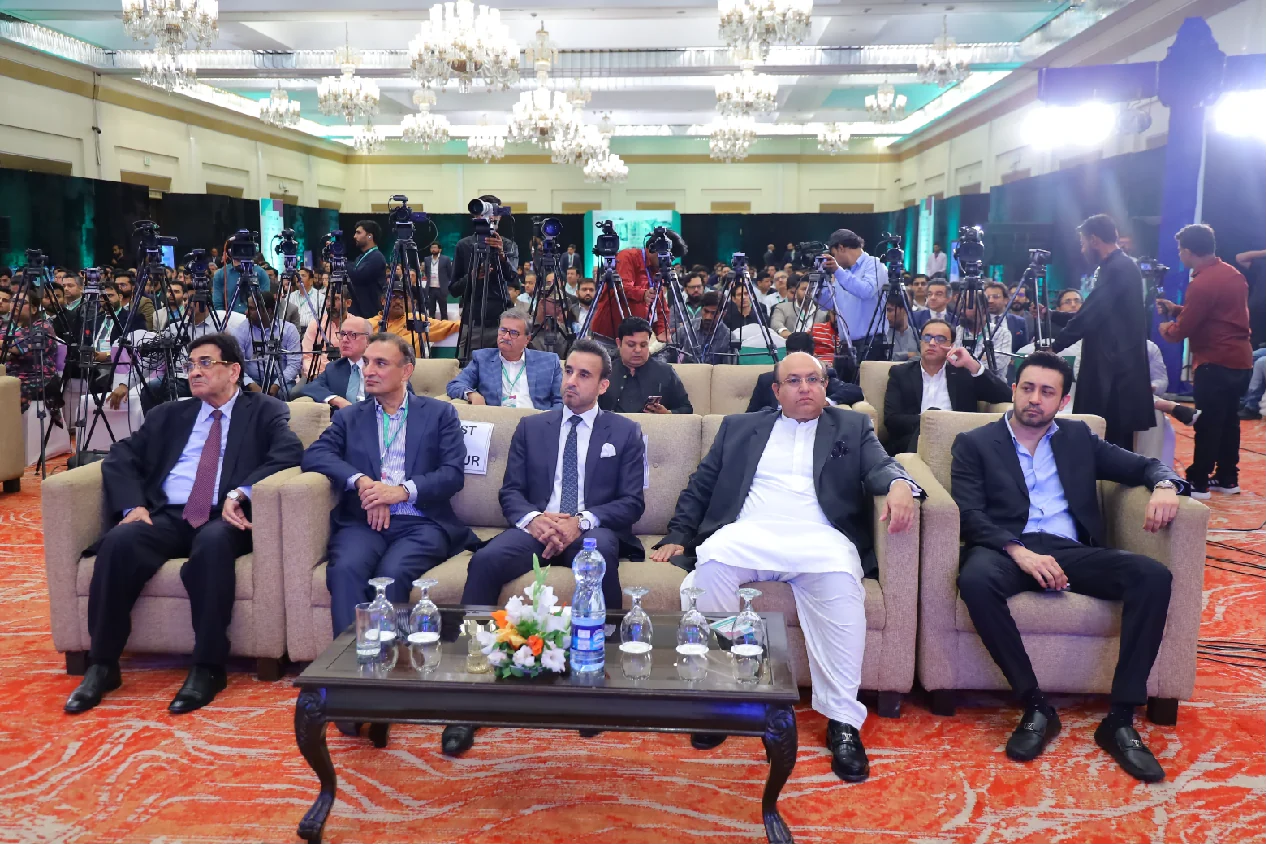 Panel session in front of a full auditorium