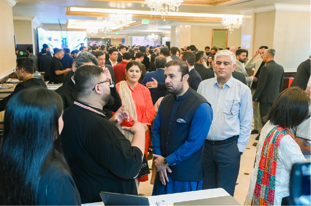 Delegates networking in the summit hall